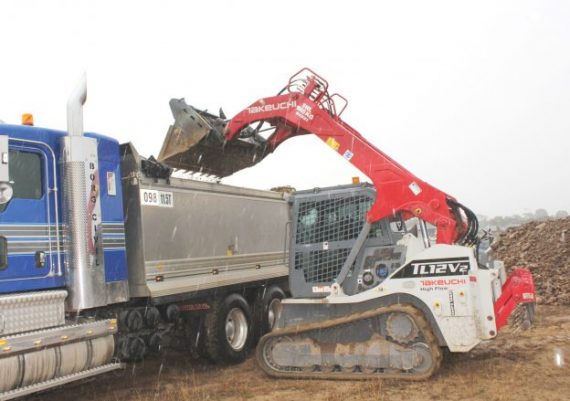 SM-7018-Borg-Loading-truck-in-rain-624×439 Takeuchi TL12V2 track loader speeding site preparation